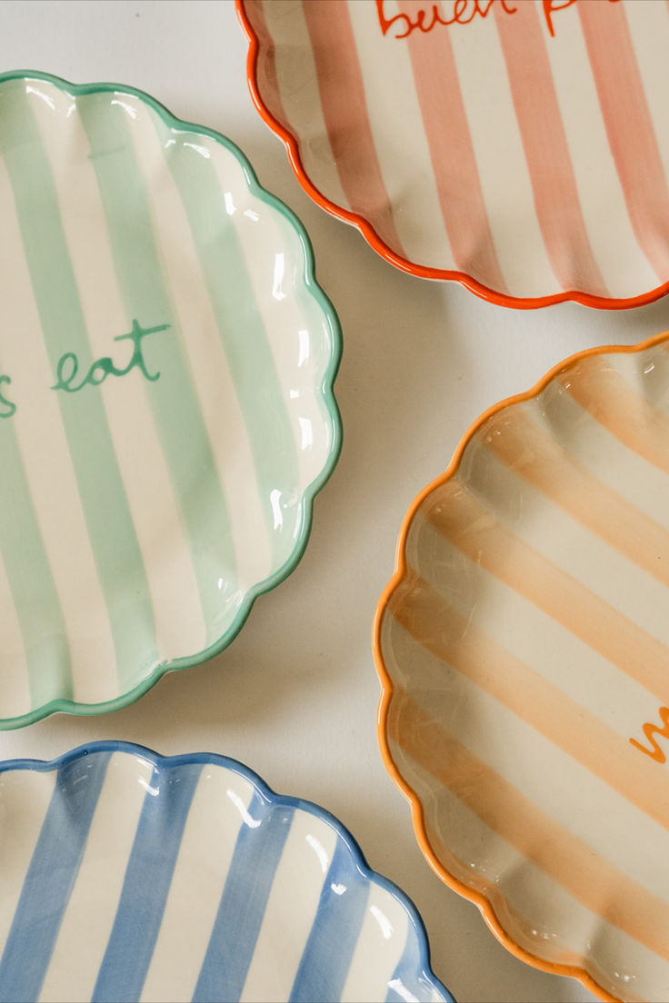 Scalloped pastel ceramic plates with softly shaped edges